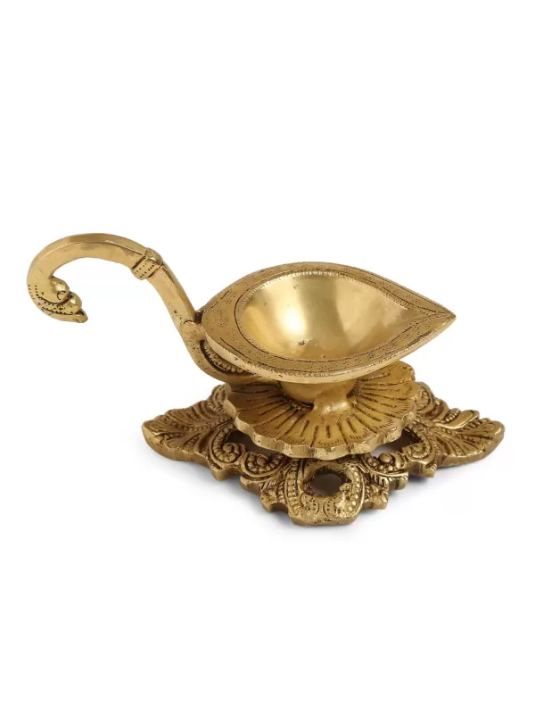 Brass Diya with Handle and intricate base – Amoliconcepts - Amoliconcepts