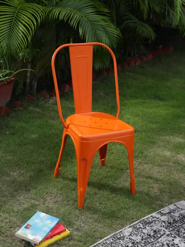 Powder coated Iron chair in orange colour - Amoliconcepts